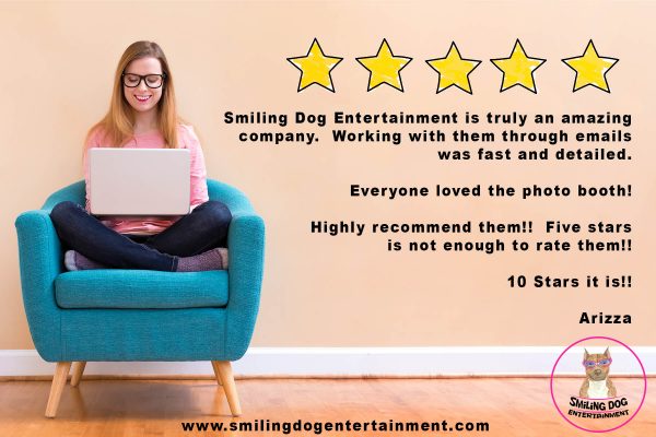 Five star rating with young woman using her laptop in a chair